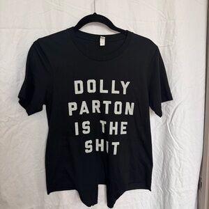 Dolly Parton is the Sh!t tee. Cut at botton to tie up to a crop top.